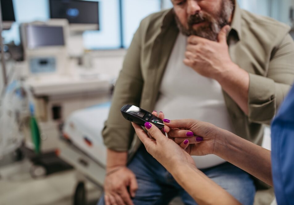 Doctor,Checking,Blood,Glucose,Level,Using,A,Fingerstick,Glucose,Meter,